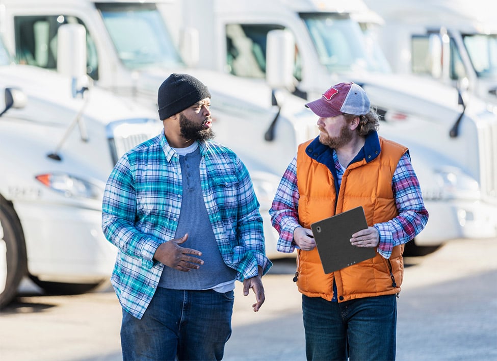 Fleet manager talking with driver